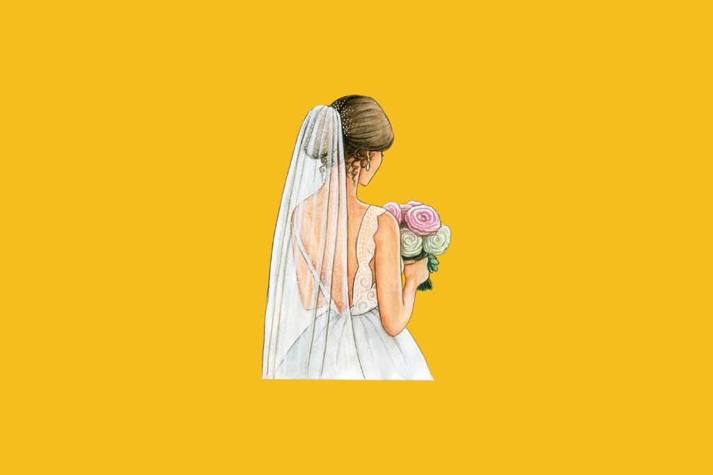 a bride holding flowers in her hands