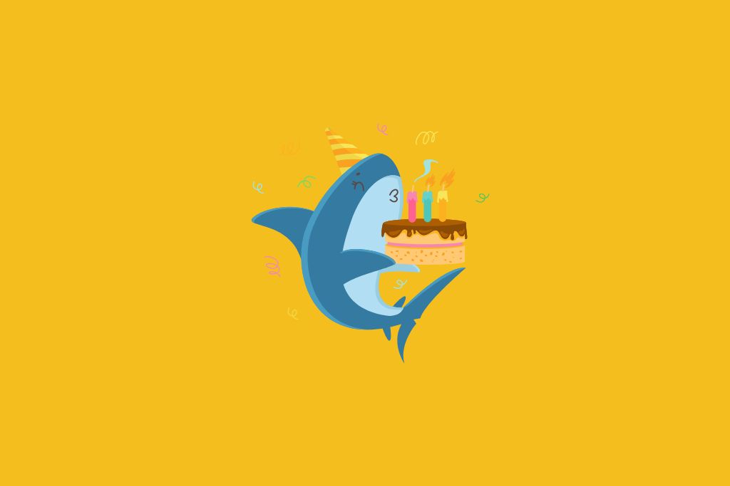 whale carrying cake with candles
