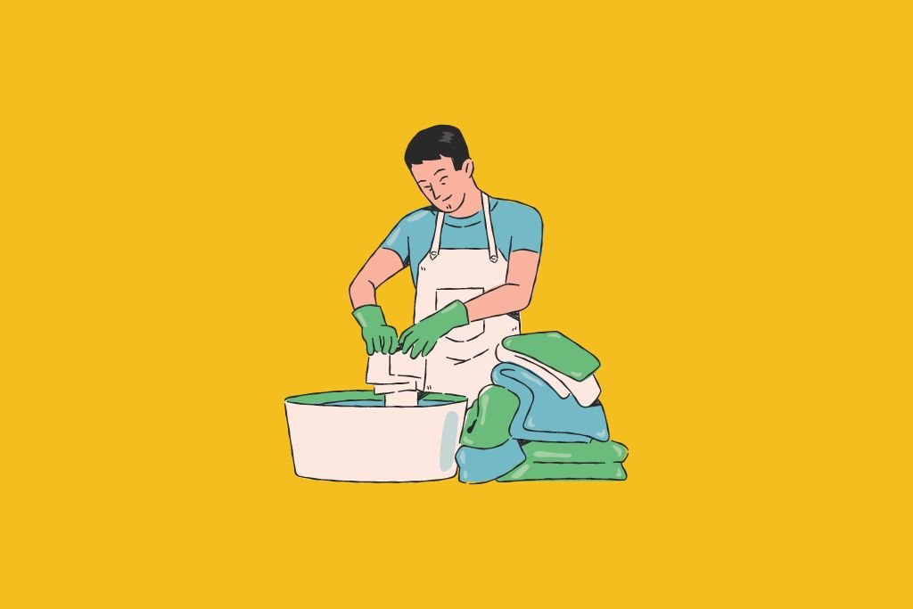 a washer man is washing his clothes