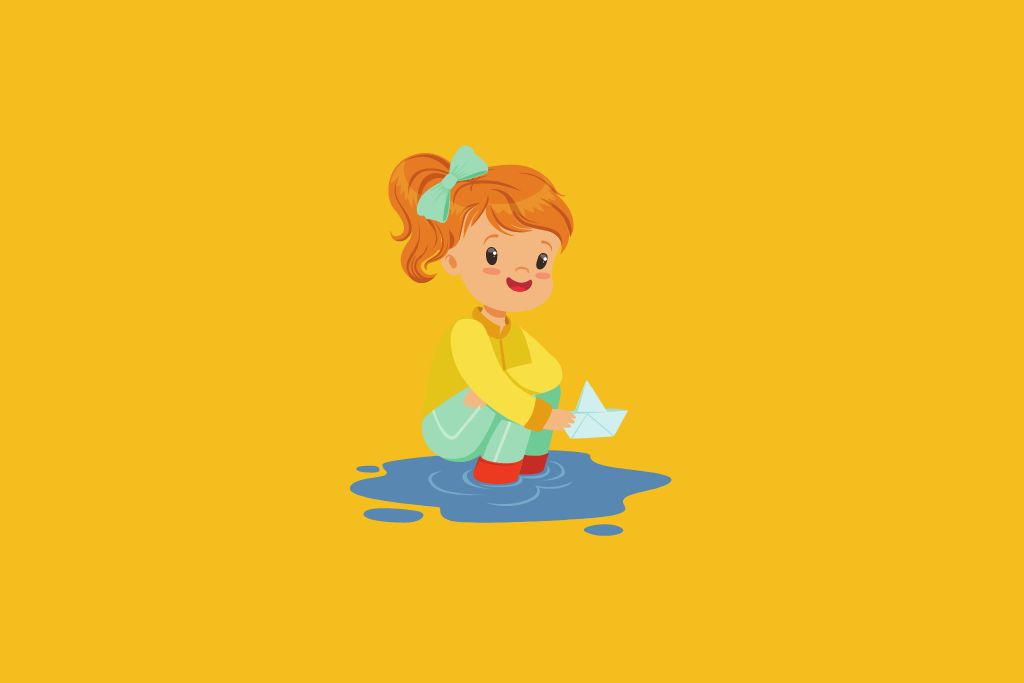 a girl playing with a paper boat