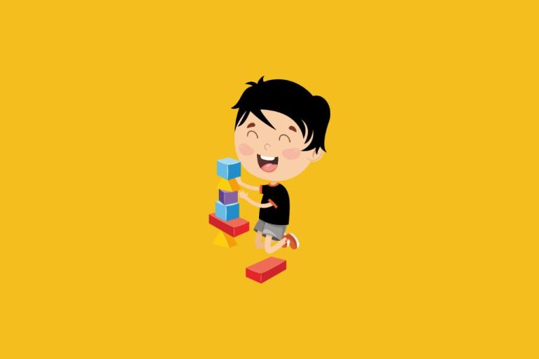 a boy happy to solve a puzzle